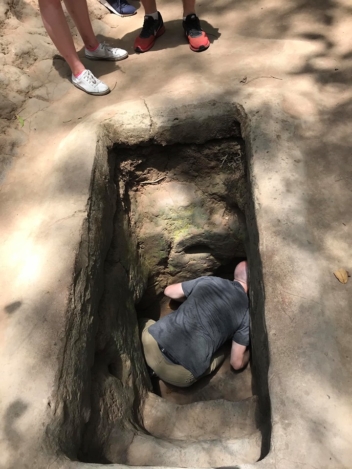 The entrance to one of the Cu Chi tunnels. Doug has dropped in to look through but his shoulders are too broad to even get his head in.