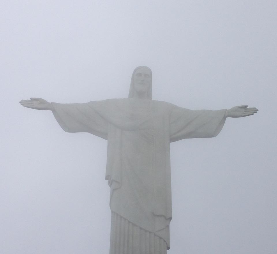 Photo of Christ the Redeemer surrounded in cloud