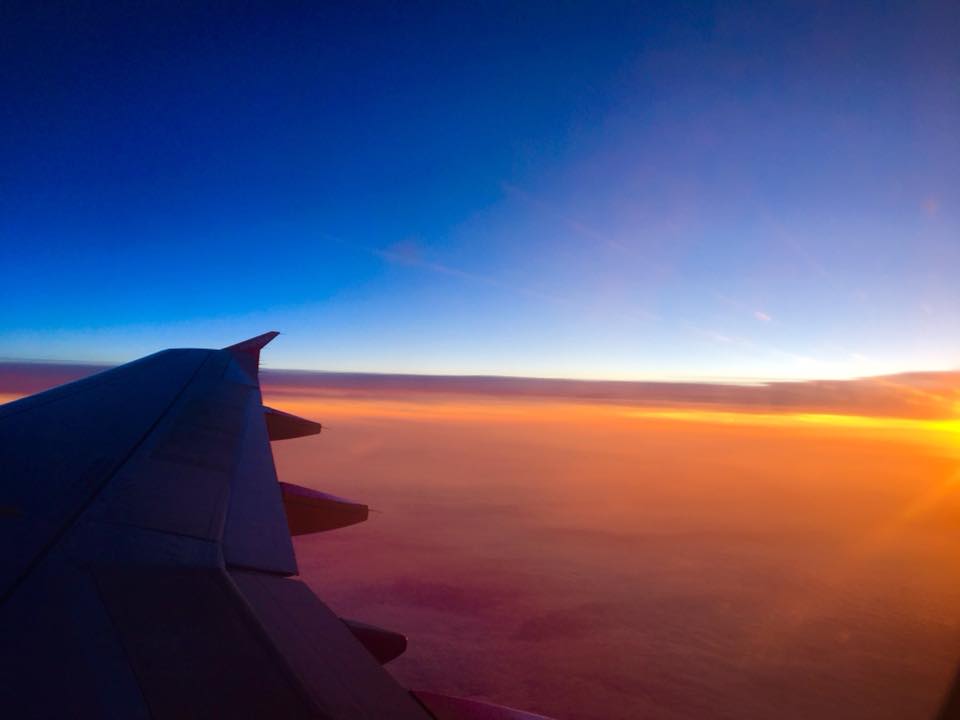 Sunset from an airplane window, let the travelling commence! 