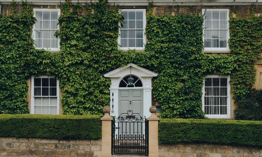 Ivy covered house on Broadway high street