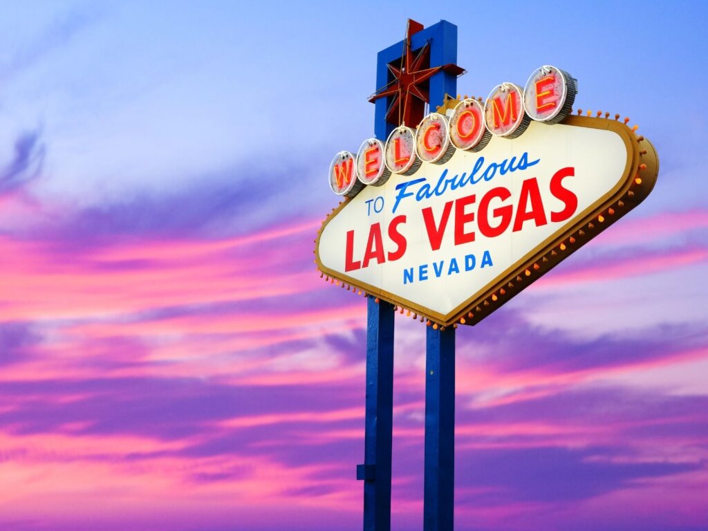 Welcome to Vegas sign with a beautiful pink and purple sky in the background