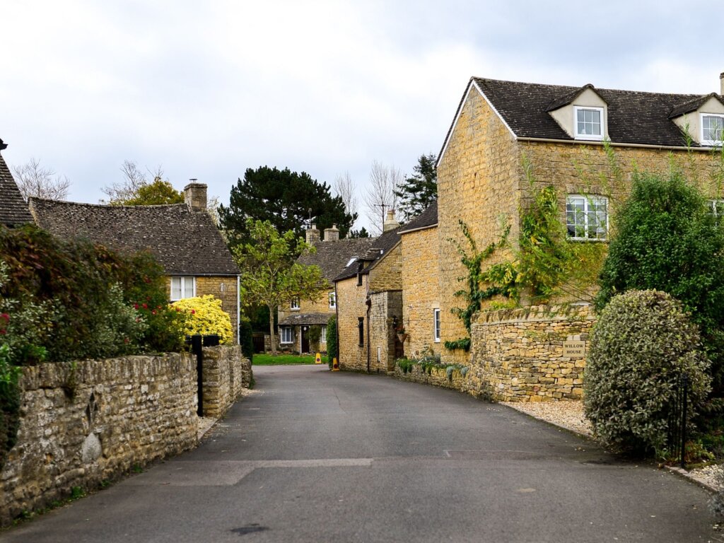 One of the many lovely streets in Bourton on the water, with it's honey coloured stone houses and dry stone walls