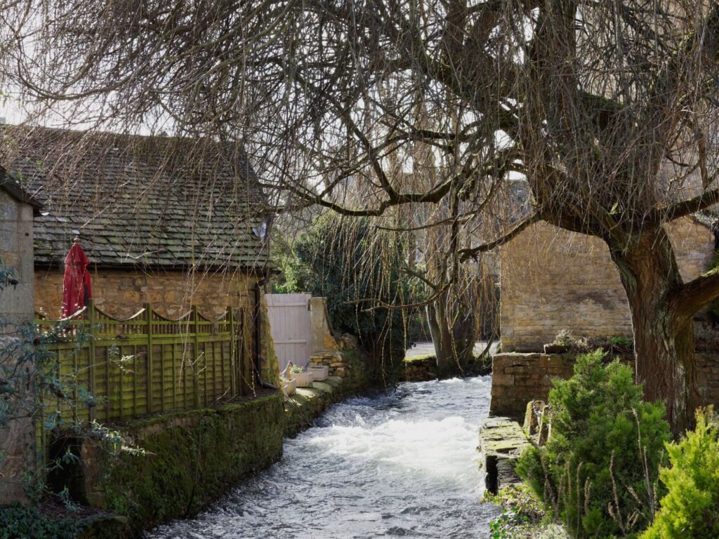 Rushing water through Bourton on the Water