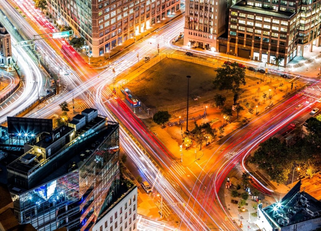 A busy night time long exposure shot of the streets in New York