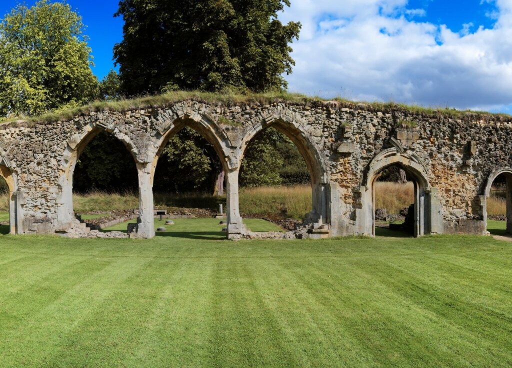 Some of the remaining arches of Hailes Abbey, one of the best day trips to do from Winchcombe