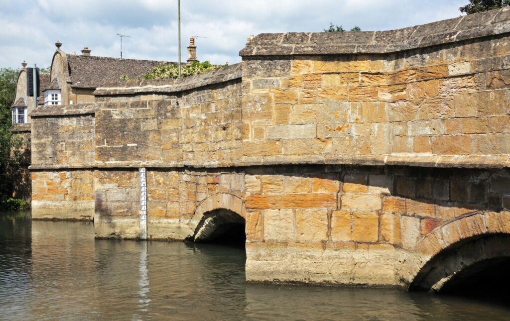 The beautiful medieval bridge crossing the River Windrush