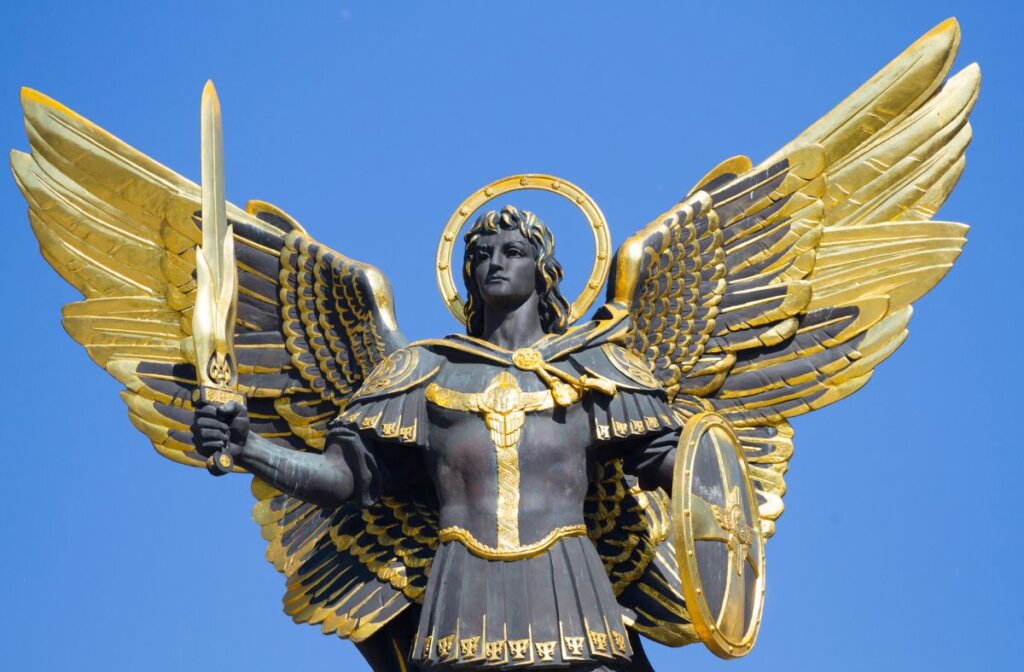 A statue of a man with golden wings holding a sword and shield symbolises the Archangel Patron of Kyiv