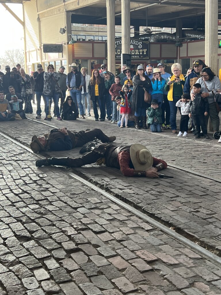 Two dead bank robbers on the floor