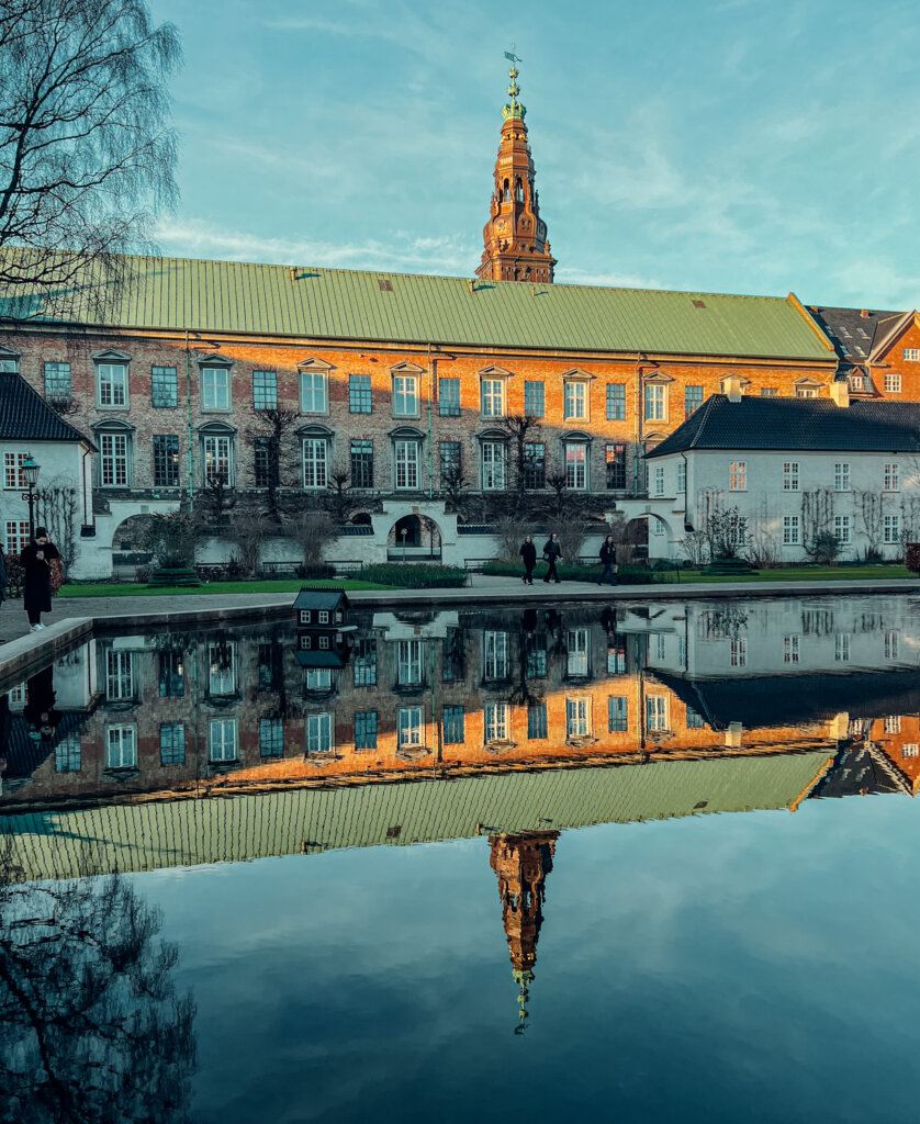 A walk through the Royal Library gardens is free and beautiful! The building reflects back on the perfectly still pond