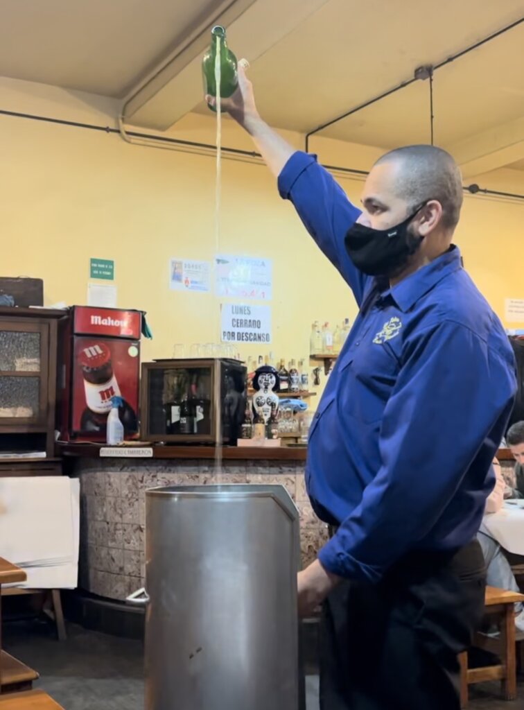 The traditional way of pouring cider in Asturias 