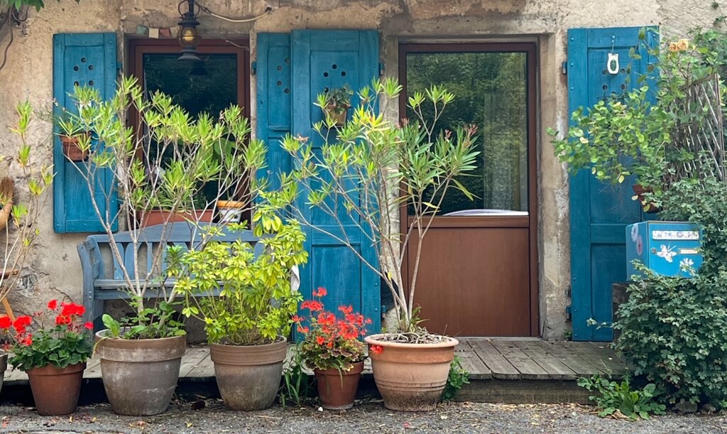 A colourful doorway spotted while exploring one of the many tiny villages that surround Lake Annecy