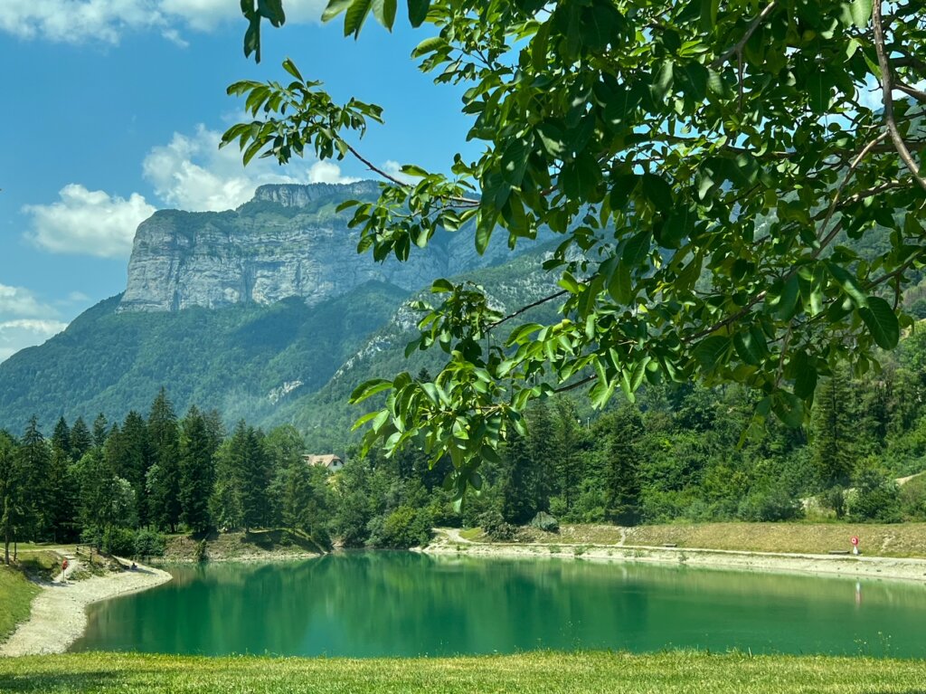 The tiny small man made Lake Thuy with an impressive mountain backdrop