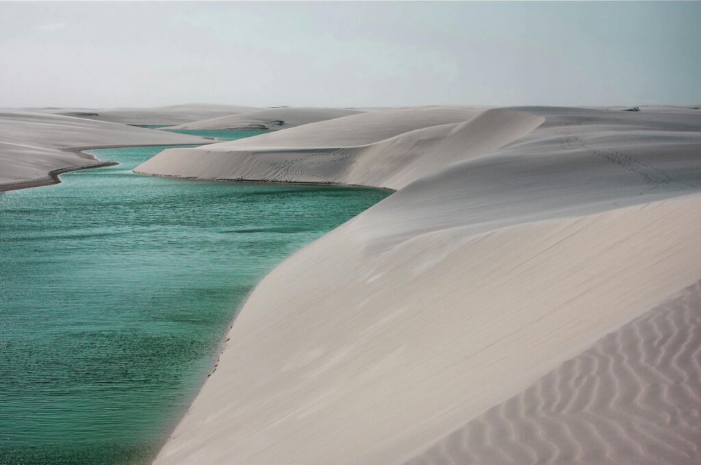 river between white sand formations