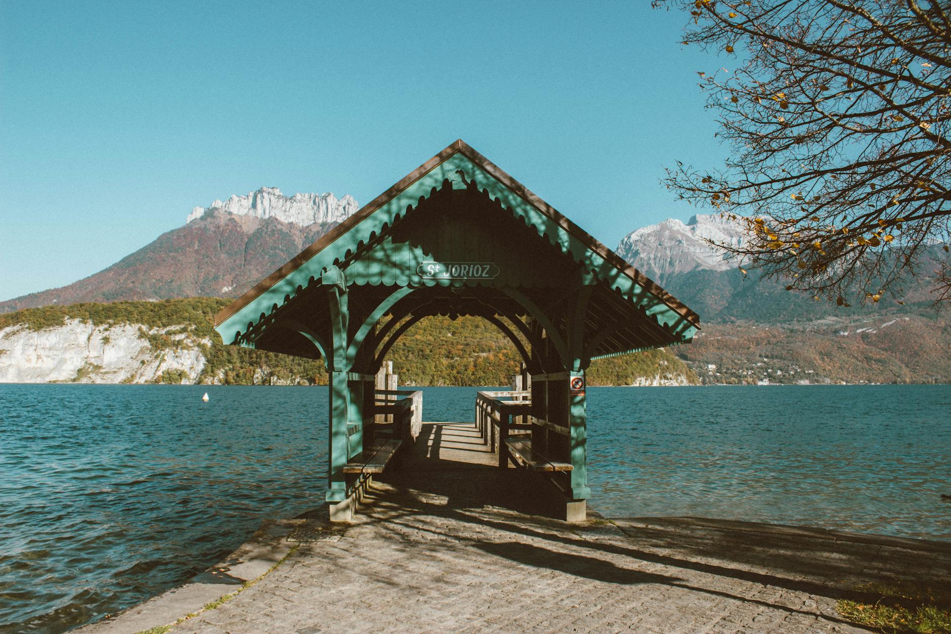 bridge leading into a lake in annecy