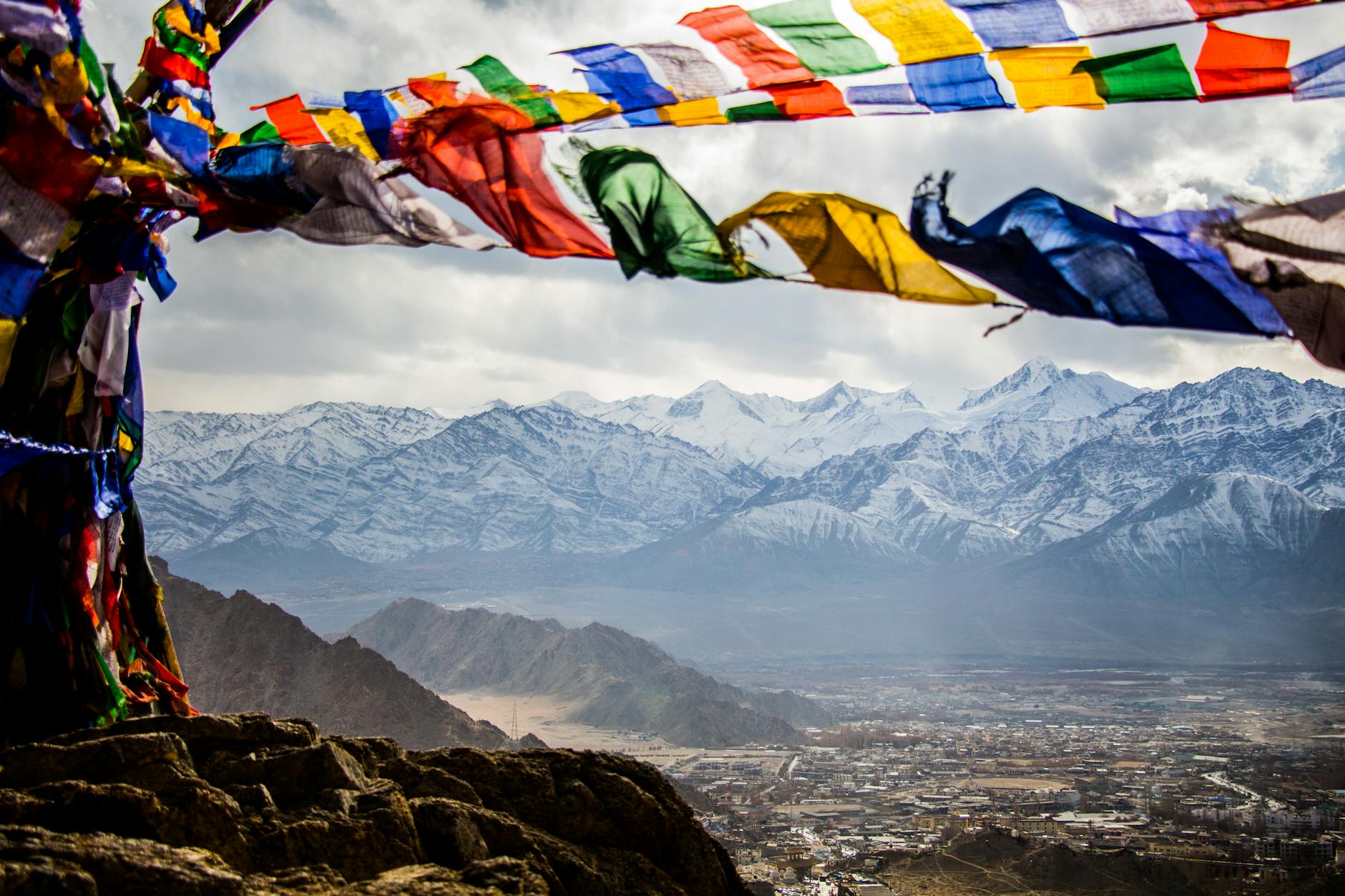 assorted color banners on mountain